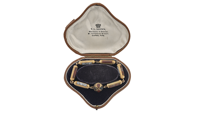 c.1870.<br>An Engraved Gold Bracelet set with<br>Scottish Agates - cased