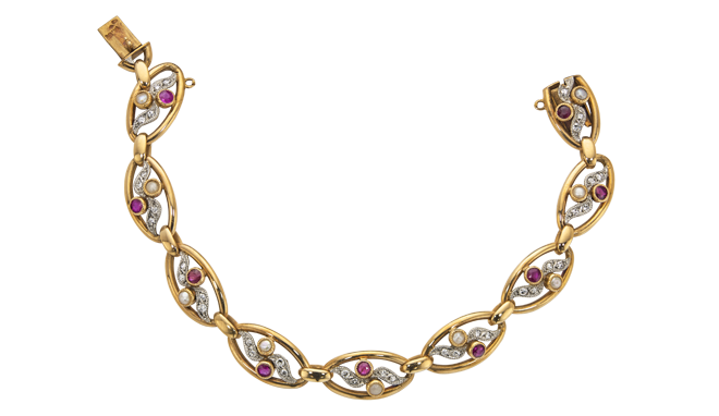 French.<br>Belle Epoque.<br>A Ruby, Diamond & Pearl set Two-colour Bracelet