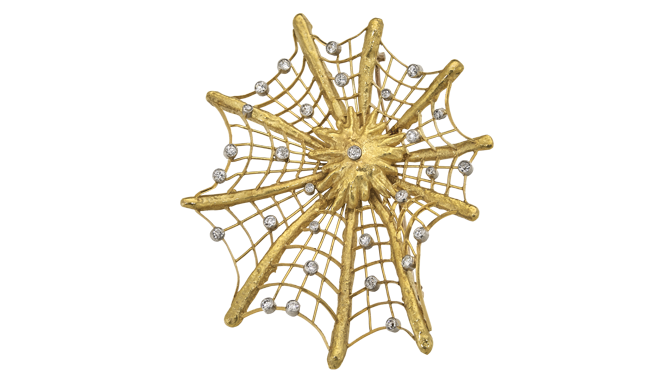 Late C20th.<br>A Diamond set Spider's Web Brooch<br>(Est.: 0.90ct)